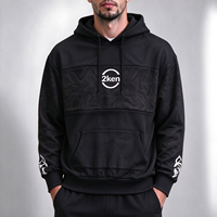 Sweat-shirt à capuche pour homme, noir, avec empiècements jacquard, logo circulaire imprimé, poche kangourou, manches longues, style streetwear, OEM ODM, vente en gros