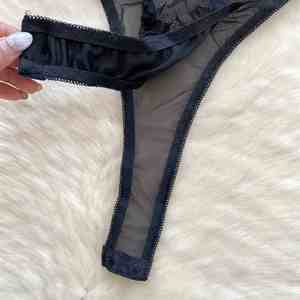 Mono sexy con cuello en V y corte ajustado para mujer, body de encaje con cintura alta y aberturas, monos sexys para mujer al por mayor - Product Image 3