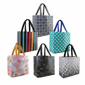 ถุงช้อปปิ้งน่ารักแบบพกพา น้ำหนักเบา ราคาประหยัด สำหรับตลาดนัด ทำจากผ้าไม่ถักทอ ใช้ซ้ำได้ พร้อมบริการสกรีนลายส่วนตัว - Product Image 1