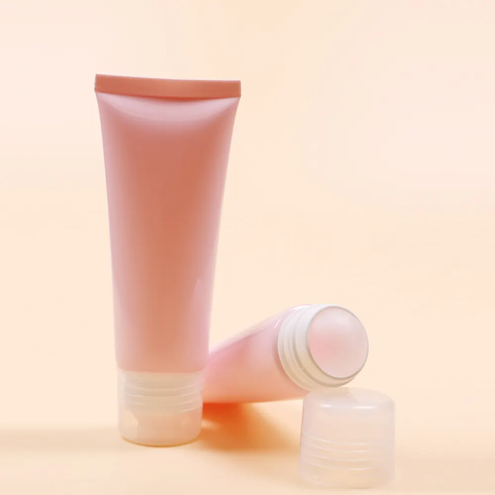 Schlussverkauf rosa Kunststoffröhrchen leere Körperlotion Massagefunktion mit klarem Ball für Körperlotion oder Massageöle