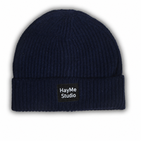 Bonnet tricoté uni streetwear hiver en promotion avec étiquette tissée personnalisée