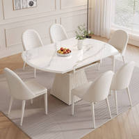 Table à manger ovale extensible moderne en gros, plateau en cuir, pieds en acier, meuble idéal pour gagner de la place dans les petits appartements