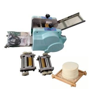 Petite machine motorisée pour garnir les enveloppes de roti, en acier inoxydable 304, capacité de 70 pièces/minute - Product Image 1