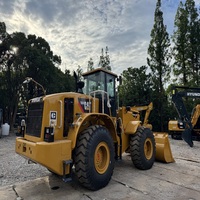 Chargeuse sur pneus CAT 966H d'occasion en excellent état, 6,5 tonnes de charge nominale, faible nombre d'heures de fonctionnement, pour travaux de carrière et de construction