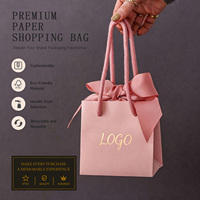Op maat gemaakte logo sieraden cosmetica luxe verpakkingszakken cadeauzakjes voor bruiloftsgeschenken met strikband handvatten