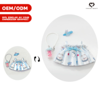 Ensemble quatre pièces : Robe à bretelles florale colorée, Costume de poupée Teddy Bear, Lunettes à monture bleue, Sac à bouteille