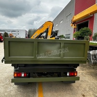 Camion benne hydraulique 4x2 Isuzu KV100 de Chine avec grue intégrée et benne basculante 4T 5T pour le transport de briques et de bois