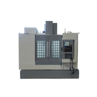 Centre d'usinage vertical VMC650, broche BT40, guidage linéaire, commande numérique FANUC, fonction automatique pour pièces en alliage d'aluminium
