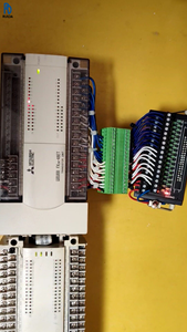 FX2N-48ET PLC ตัวควบคุมลอจิกแบบตั้งโปรแกรมได้ โมดูลควบคุมอุตสาหกรรม ชุดขยาย I/O ดิจิตอล ประสิทธิภาพเสถียร อุตสาหกรรม - Product Image 1