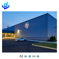 Concessionnaire de voitures préfabriquées en acier à construction rapide avec mur-rideau en verre, usine de service et espace de bureau client