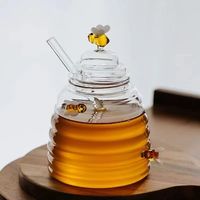 Pot en verre de miel clair de personnalisation d'usine de luxe 280ml 400ml 500ml distributeur de sirop de miel en verre de logo personnalisé
