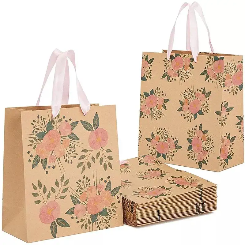 Venta directa de fábrica Bolsa de papel de flores de lujo Mango de cinta impresa Bolsa de compras personalizada Fabricante Bolsa de papel para el té de la tarde