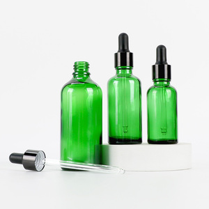 Flacon d'huile essentielle avec logo personnalisé, flacon compte-gouttes en verre vert pour huile d'aromathérapie, contenant cosmétique vide avec compte-gouttes en caoutchouc - Product Image 1