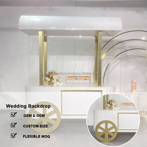 Chariot à bonbons moderne en acrylique LEDA avec roues amovibles pour la décoration de mariage en or et blanc, présentant des friandises sucrées - Product Image 2