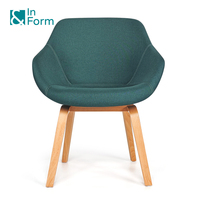 Chaise de loisirs rembourrée en mousse de moisissure vert noirâtre au design moderne Fauteuil à coque incurvée avec pieds en bois courbé