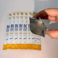 Sachet d'emballage alimentaire personnalisé à scellage central pour biscuits, sachet en plastique thermoscellé imprimé avec boîte