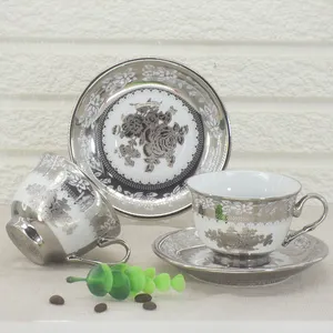 Diseño de la novedad de plata Flor de cerámica porcelana café tazas de té y platillo conjuntos