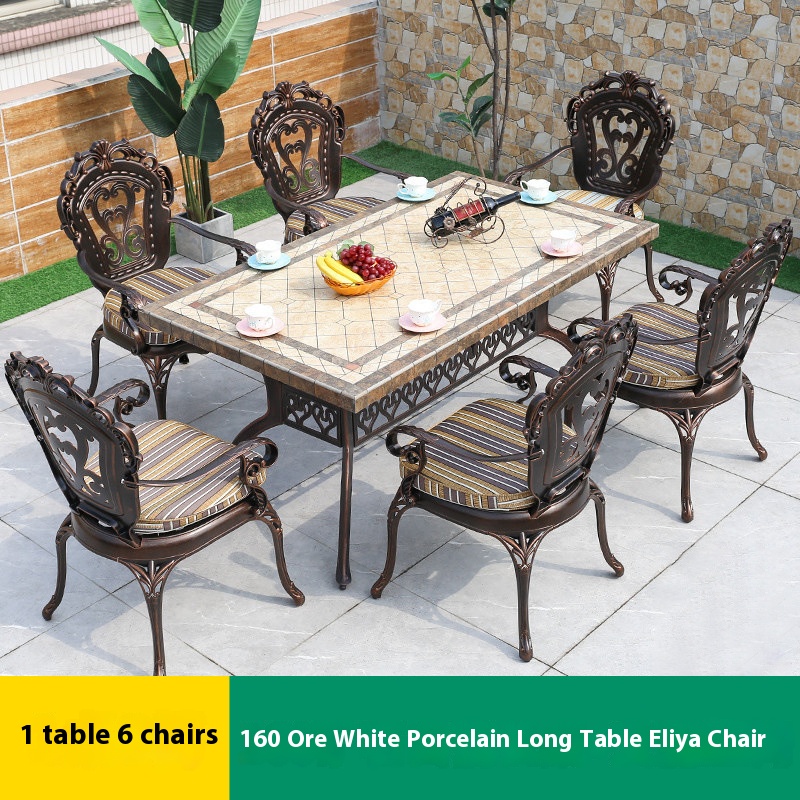 6 chaises Elya et 1 table longue en porcelaine blanc or 160 cm.