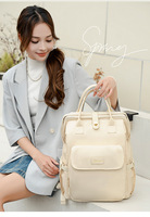 Sac à dos de luxe portable multifonctionnel pour femme, grande capacité, séparation sec/humide, fermeture éclair étanche, adapté aux bébés, tendance