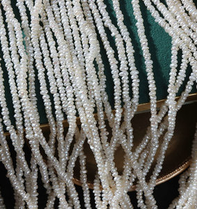 R. Gema. Hebras sueltas de 2,5mm Forma irregular Pequeño botón blanco Semilla Perlas a granel de agua dulce - Product Image 5