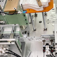Industrie de la fabrication de machines de haute technologie Pliage de gants jetables en plastique PE et machine à emballer les gants, contrôle PLC