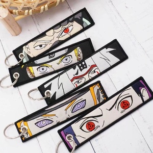 54 Design High Quality Embroidered Mixed Anime Flight Tag Keychain for Backpack Bag Decoration - Product Image 3