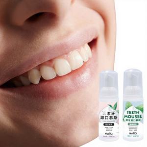 Mousse dentifrice blanchissante à la menthe naturelle avec hexapeptide et xylitol pour la reminéralisation des enfants - Product Image 1