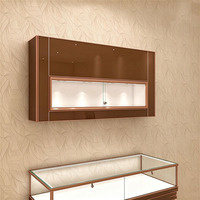 Vitrine à bijoux de luxe sur mesure, murale, en verre, pour boutique de détail, avec éclairage LED