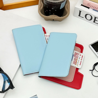 Porte-passeport en cuir PU bicolore avec emplacements pour cartes, organiseur de passeport portable, étui de voyage pour passeport
