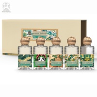 Boîte à vin liquide dorée Shenzhen Wanxiang Packaging, coffret cadeau pour cinq bouteilles de liqueur blanc cassé, design à couvercle rabattable, bouteilles en verre de 125 ml
