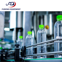 Machine de remplissage linéaire pneumatique automatique d'occasion prête à l'emploi pour la production de liquides (boissons, huiles, cosmétiques, produits chimiques, aliments)