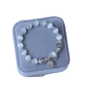<span class=keywords><strong>Bracelet</strong></span> de perles œil de chat naturel avec pendentif papillon en cristal <span class=keywords><strong>clair</strong></span> de <span class=keywords><strong>lune</strong></span> Style unisexe classique pour cadeau - Product Image 1