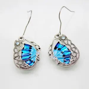 Kadın özel tasarım Metal takı pirinç malzeme Vintage stil kız bayanlar kristal mavi emaye büyük kelebek küpe
