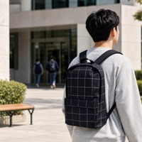 Sac à dos scolaire Oxford 300D noir et blanc à carreaux avec poche avant et fermeture éclair pour le campus et l'usage quotidien