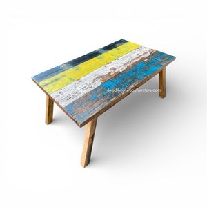 La table basse CT Angso présente un design antique en bois durable avec des accents multicolores vibrants dans une conception spacieuse de 100x60x45 CM. - Product Image 1