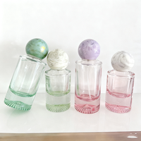 Bouteille vide de parfum de luxe en verre bleu rose clair personnalisé de 30ml 50ml 100ml