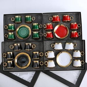 Meilleures ventes en Arabie Saoudite - Ensemble de 12 tasses à expresso et soucoupes en céramique plaquées or à pois - Expérience de café de luxe 80 ml - Product Image 1