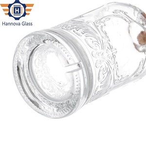 Bouteille en <span class=keywords><strong>verre</strong></span> ronde décorative de 700ml avec logo personnalisé et motifs <span class=keywords><strong>vintage</strong></span> en relief pour alcool whisky <span class=keywords><strong>rhum</strong></span> et spiritueux - Product Image 4