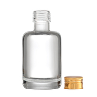 Vente d'usine – Flacon de parfum de luxe en verre transparent rond de 100 ml, fond épais, vide, avec vaporisateur