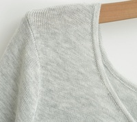 Cardigan asymétrique en tricot pour femme, mélange de laine, manches longues, boutonné, à volants, coupe ajustée, décontracté, vente en gros OEM ODM