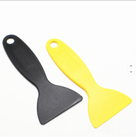 2026 Spatule à mastic jaune en plastique, outil de nettoyage mural multi-usages avec trou de suspension