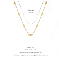 QIAOREN 11731 Collier Minimaliste Élégant Multi-Cœurs en Acier Inoxydable Doré, Bijou 3D en Forme de Cœur Gonflé, Cadeau pour Femme