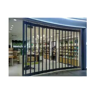 Puerta plegable de policarbonato con persiana enrollable transparente para garaje, corredera comercial