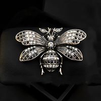 Broche vintage tendance avec nœud, micro-incrustée de zircon coloré, corsage en ruban, accessoires pour manteau et costume pour femme, broche pour vêtements