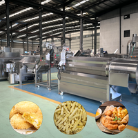 Machine de friture industrielle entièrement automatique à fonctionnement continu, friteuse continue adaptée à une ligne de production d'aliments frits surgelés