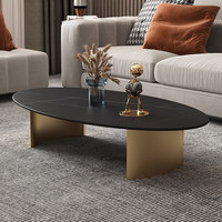 Table basse ovale moderne minimaliste de luxe léger avec plateau en ardoise et structure métallique pour salon et usage domestique