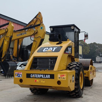 Compacteur vibrant à tambour unique d'occasion Caterpillar haute performance pour projets de construction routière