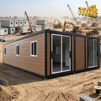 Villa de villégiature mobile modulaire préfabriquée moderne de luxe de 30 pieds avec cadre noir et jaune désert, extensible, type maison conteneur, pour supermarché