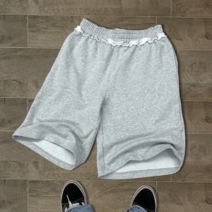 Shorts de jogging imprimés à bords bruts de haute qualité, pantalons amples en molleton uni, shorts de sport en coton de designer pour hommes - Product Image 1