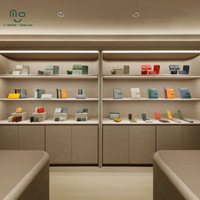 Comptoir d'exposition personnalisable éclairé par LED, respectueux de l'environnement, pour boutique de vêtements et sacs pour femmes